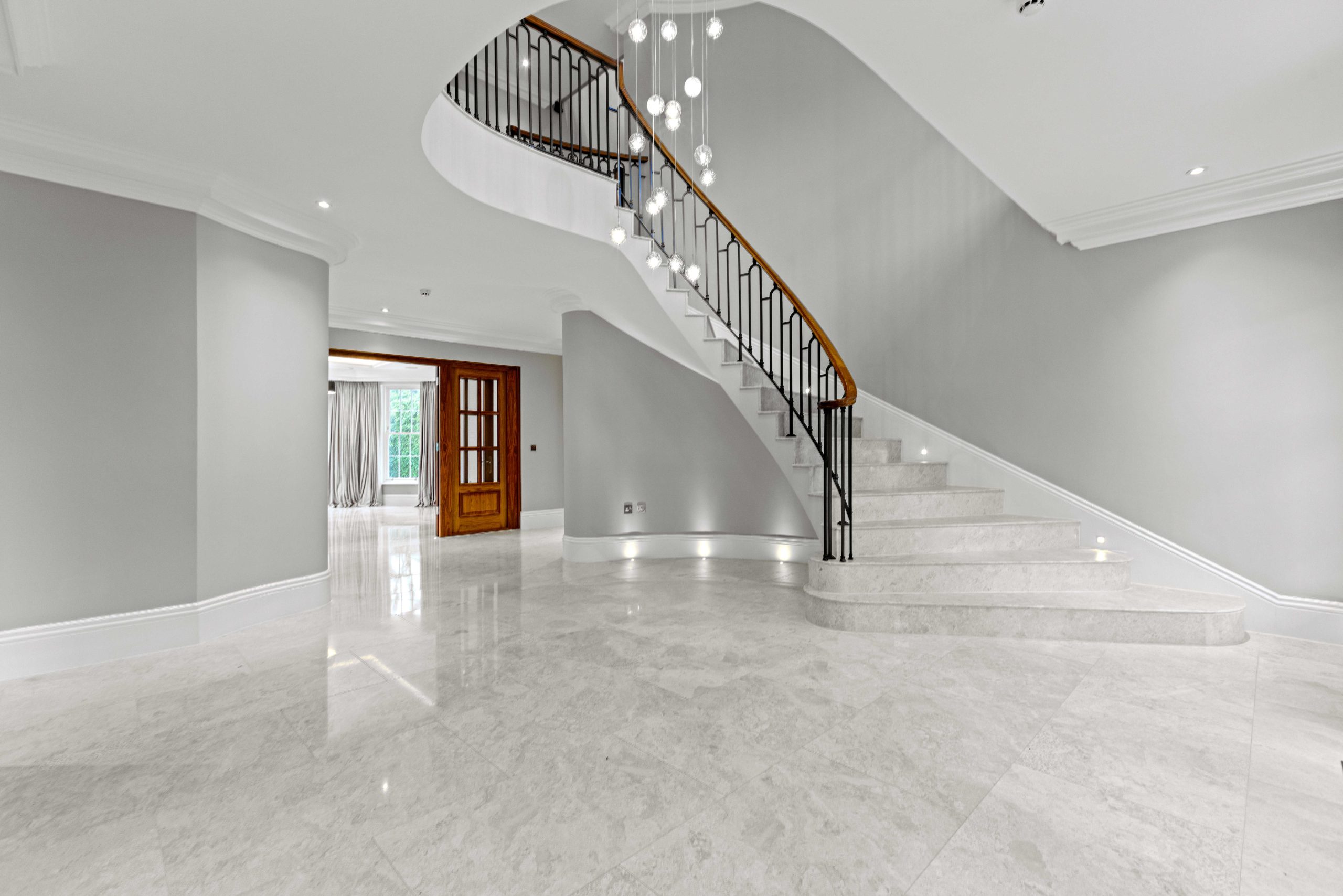 Wentworth Estate interior - main entrance hallway with curved staircase