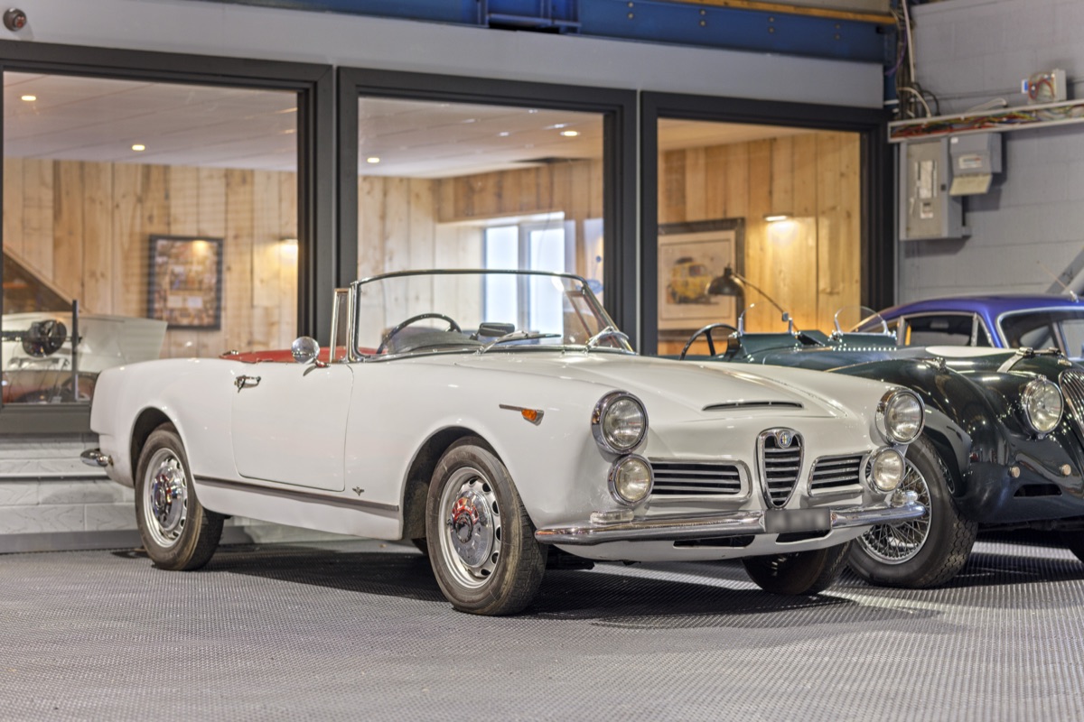 Classic Alfa Romeo Spider outside the storage facility