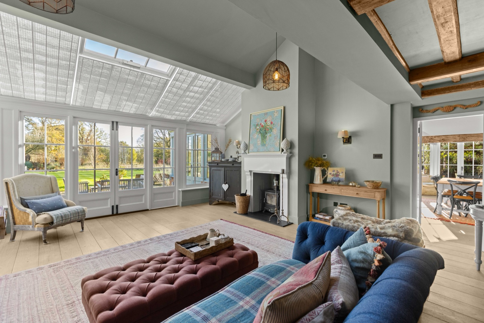 Philpot Lane, Chobham - character living room with vaulted ceiling and fireplace