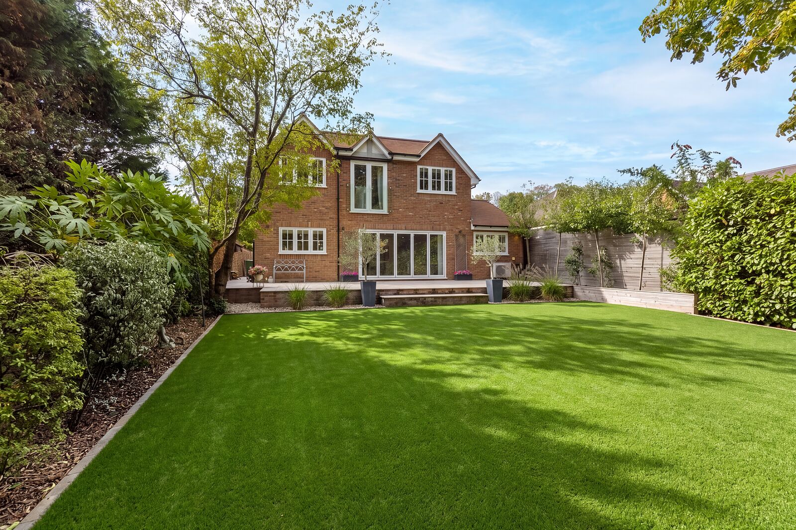 Trotsworth Avenue, Wentworth Estate - contemporary rear elevation and landscaped garden